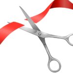 Scissors cutting a ribbon to represent Removing Unwanted DNA from Vectors