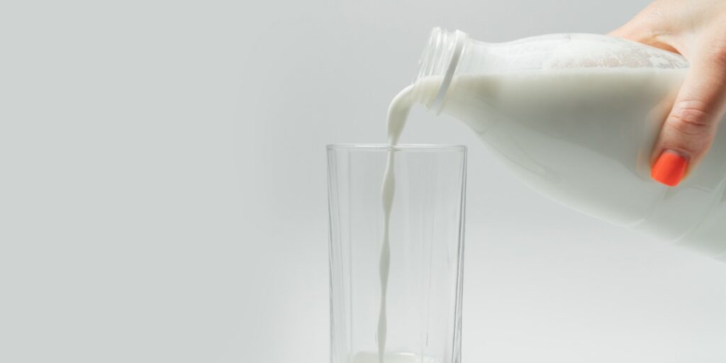 Image of pouring milk as it can be used for blocking non-specific staining