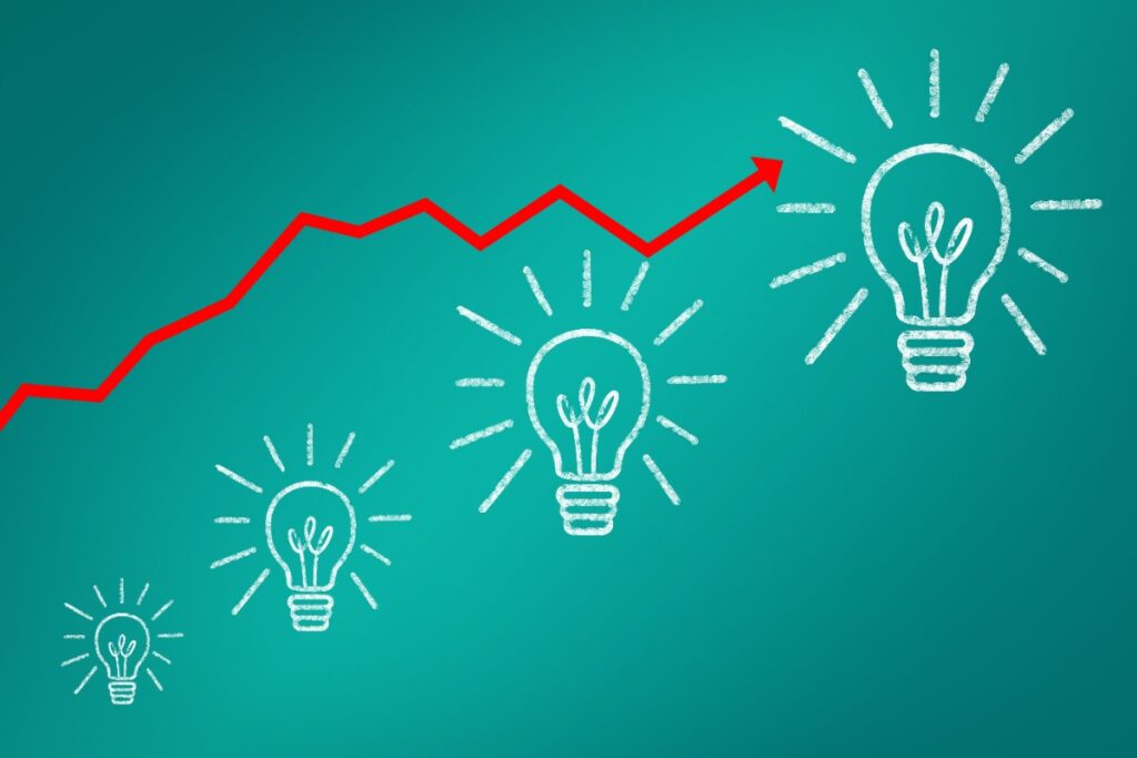 An image of red arrow with light bulbs to depict improved research reproducibility.