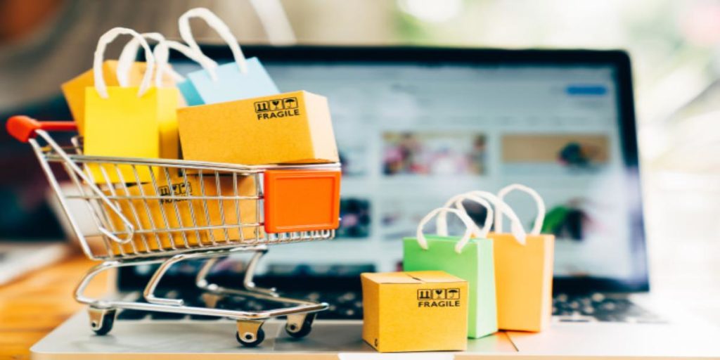 A minature shopping trolly filled with mini fragile boxes, highlighting the delicate natures of purchasing cell lines