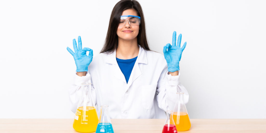 A scientist practising meditation and mindfulness in the lab.