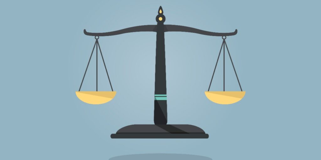 Weight scales represent weighing up the pros and cons of crispr cas9