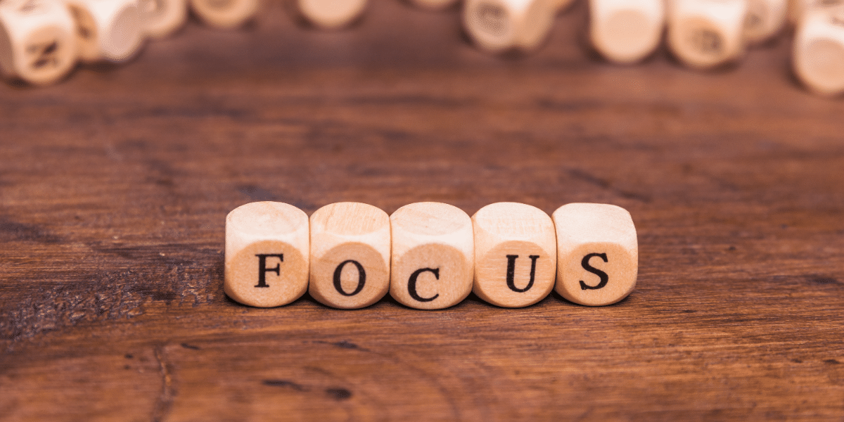 The word "focus" written one wooden blocks to emphasize isoelectric focusing