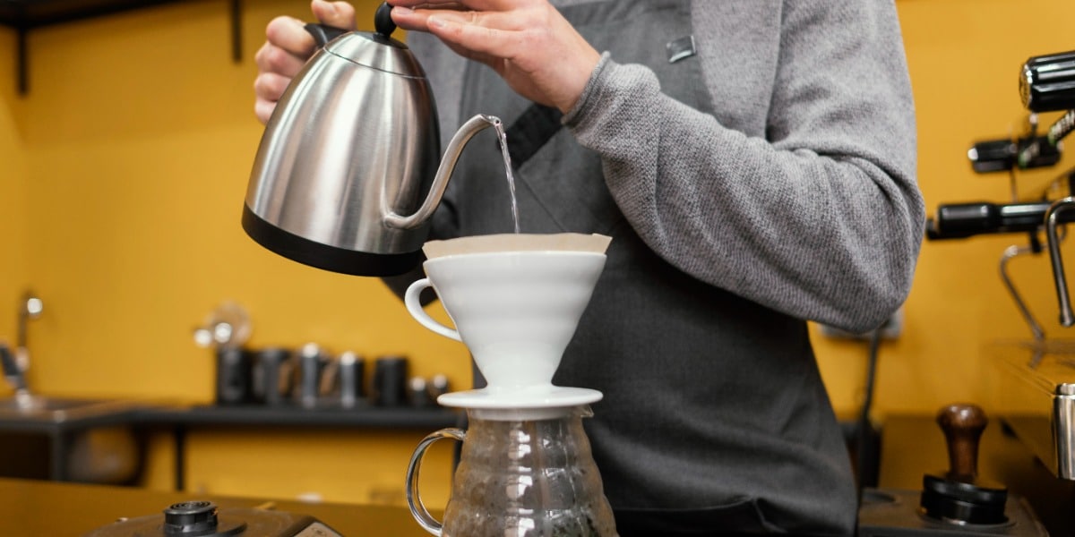 Coffee being poured through a filter to demonstrate filtration