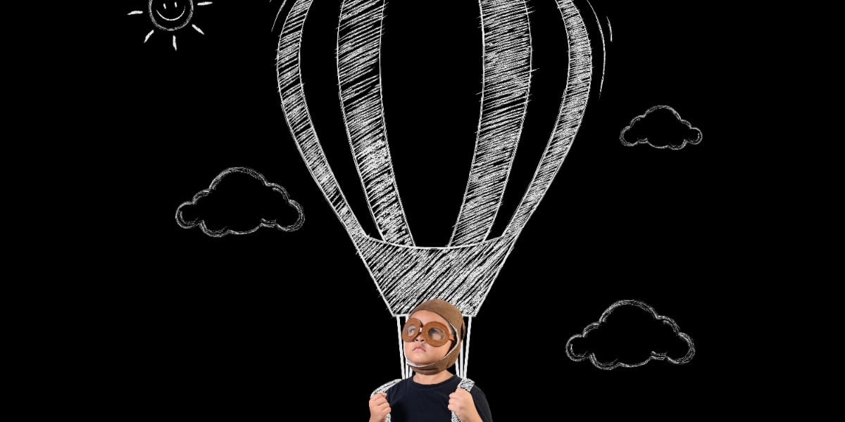 A boy with a parachute to represent boosting research by supercharging creativity in science.