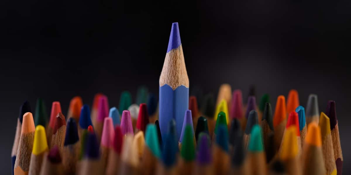 A selection of colored pencils representing spectral unmixing in flow cytometry.