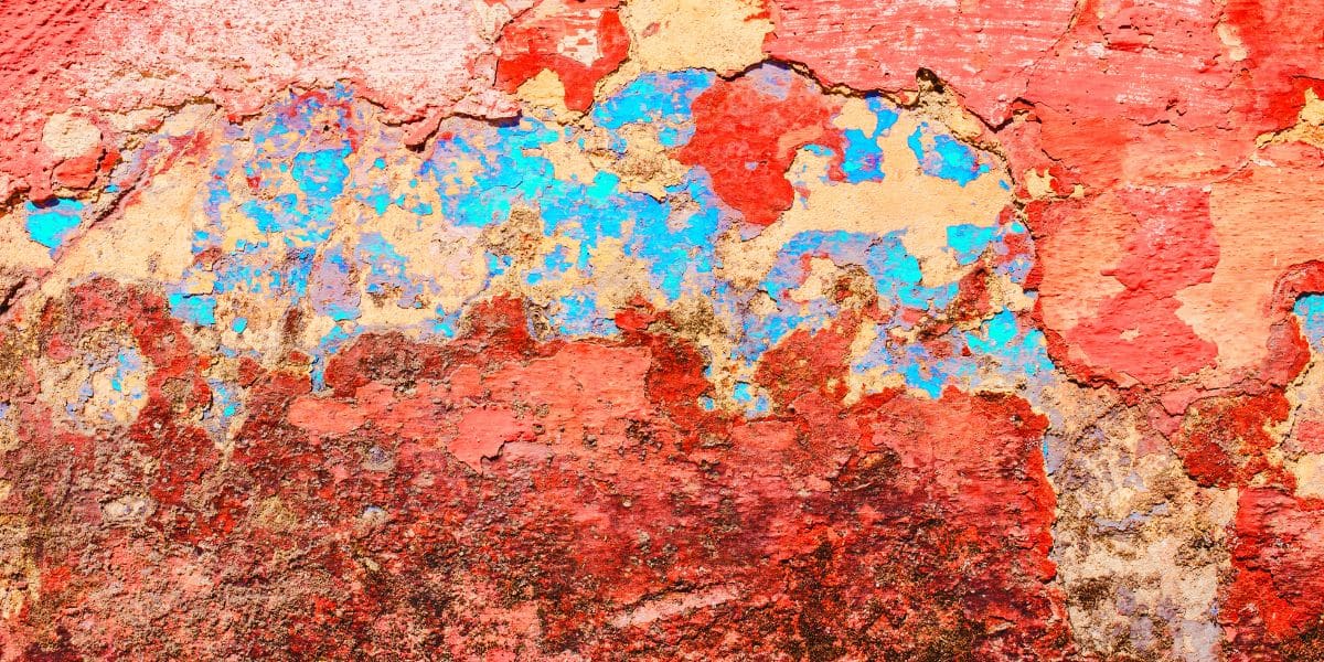 Rusted metal to depict handling bases safely in the lab.