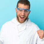 A young scientist looking please with his yeast protein extraction methods.