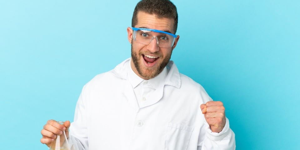 A young scientist looking please with his yeast protein extraction methods.