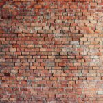 Brick wall with overhanging bricks to represent overhang PCR.