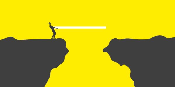 picture showing someone bridging the gap between cliffs